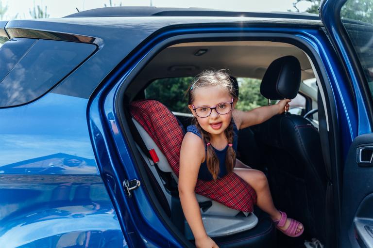 Young girl in a car seat